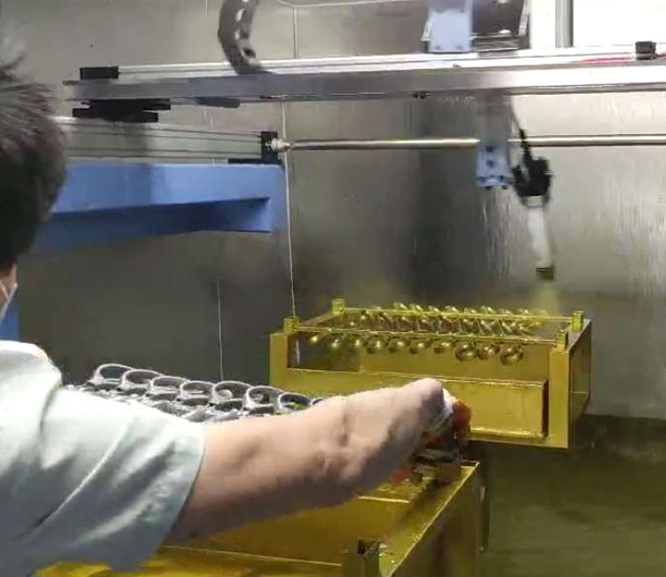 水平往复机剪刀柄喷涂-静电喷漆